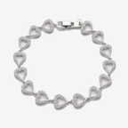 Pulsera Tennis Luxe Love de corazones en Plata 925 con circones sobre fondo gris claro