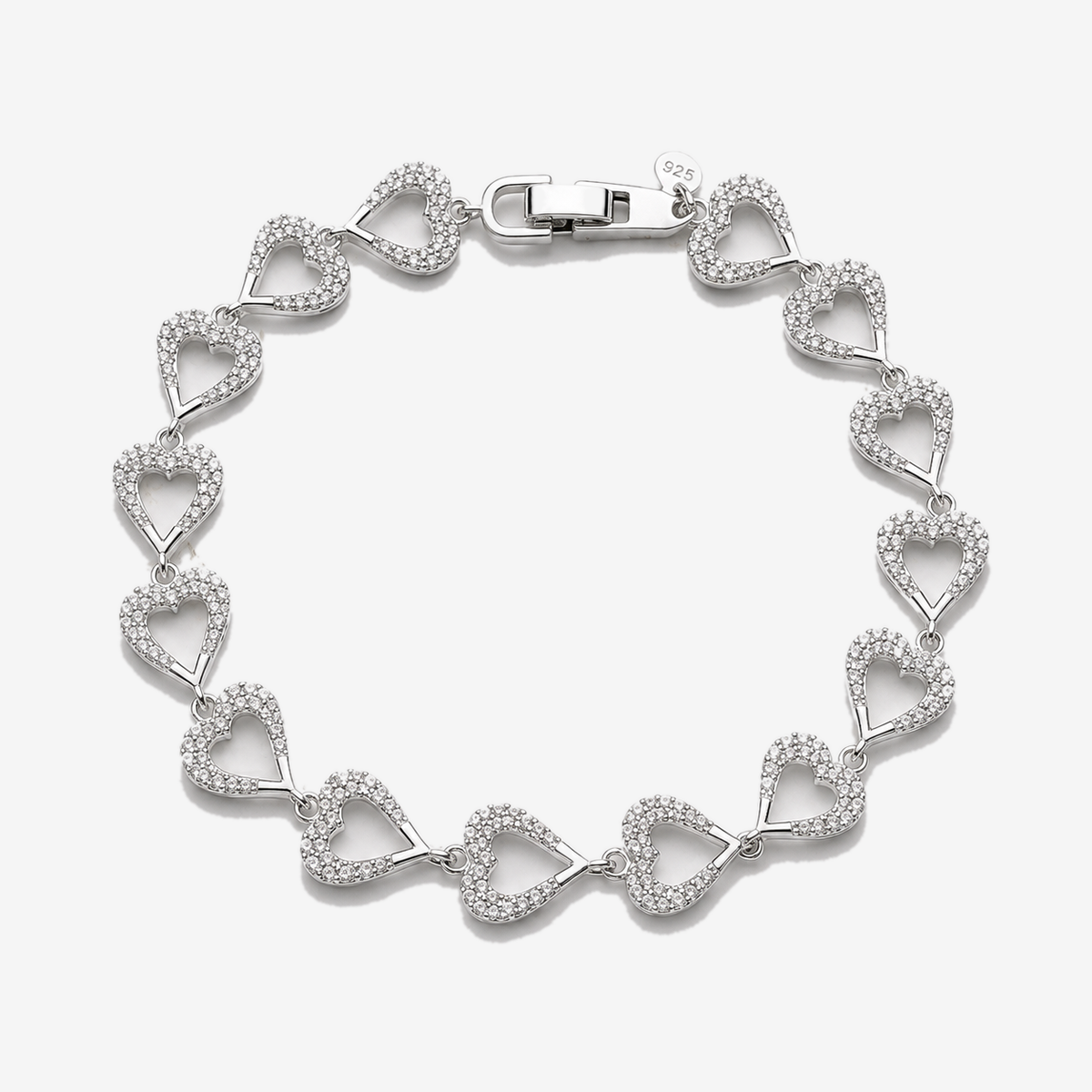 Pulsera Tennis Luxe Love de corazones en Plata 925 con circones sobre fondo gris claro